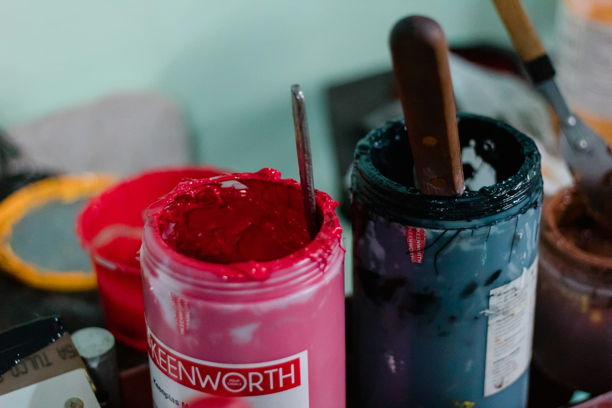 Tubs of screen-printing ink