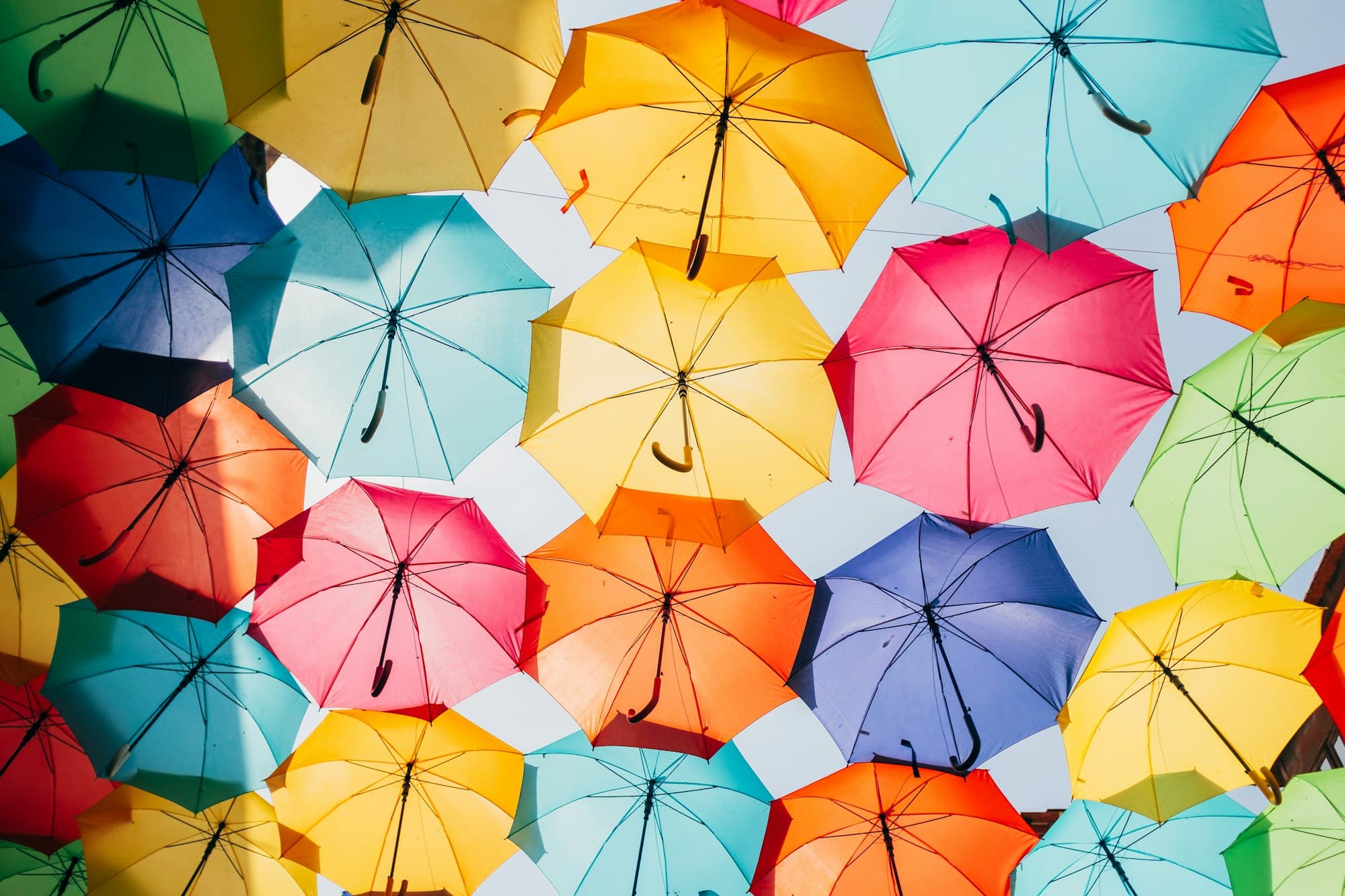 Colourful open umbrellas